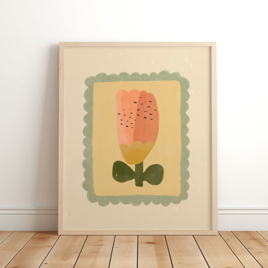 Coral and mustard flower children’s art print with sage scalloped border in a light wood frame