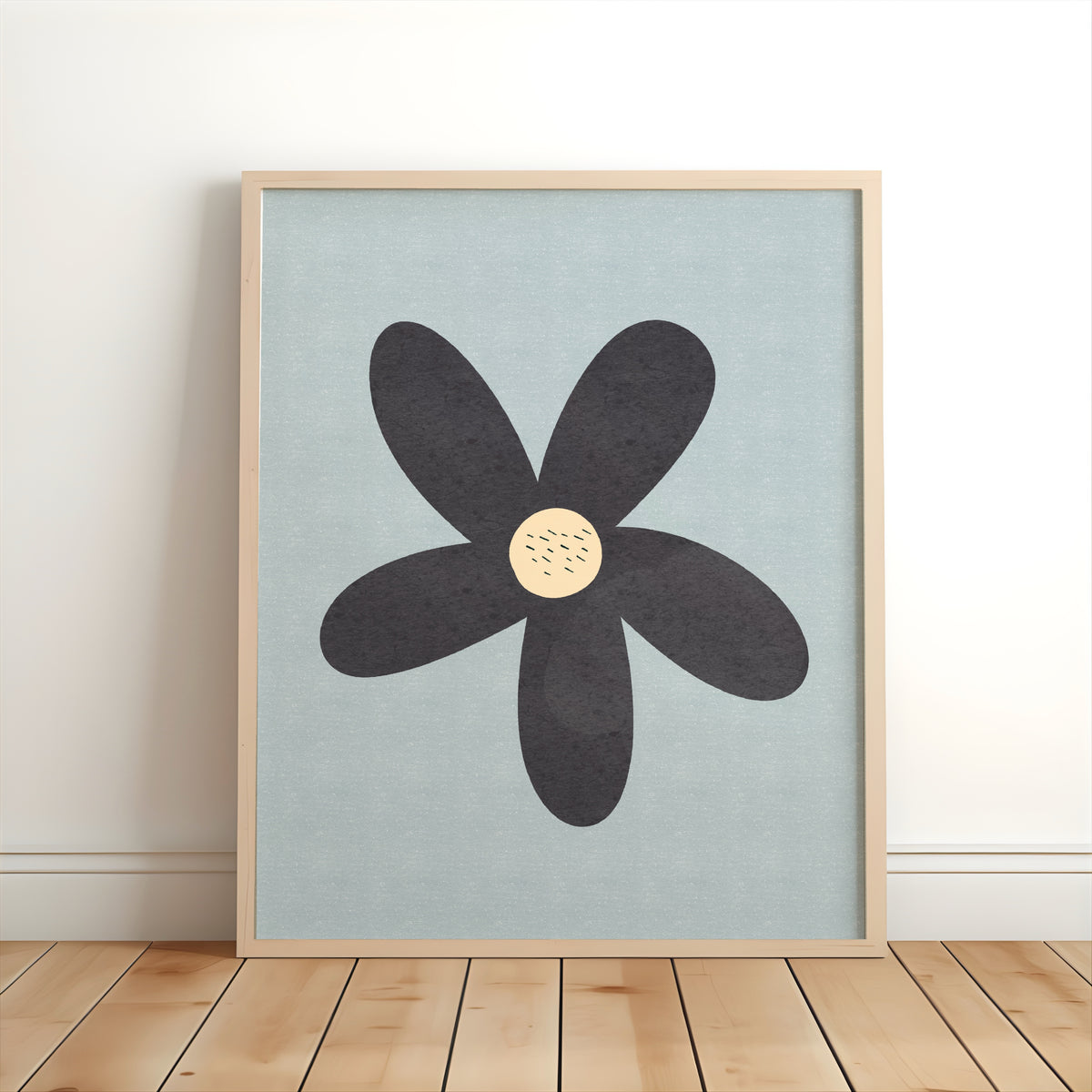 Charcoal floral nursery print with a cream centre on a soft blue background for children’s bedrooms and playrooms.